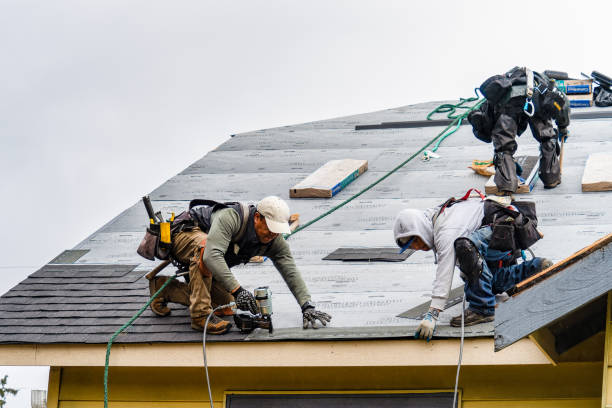 Professional Gutter Installation technician working in Spring Glen, PA